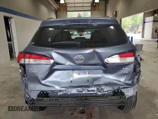 2024 Toyota Corolla Cross LE z VIN 7MUBAABG7RV106693, wystawiony jako Copart lot #53959255 z przebiegiem 25 874 mil mil oraz Szkoda całkowita • Salvage title. Historia ofert i sprzedaży dostępna na DreamBid. Obrazek 6.