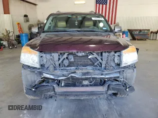 2014 Nissan Armada Platinum z VIN 5N1BA0NFXEN610416, wystawiony jako Copart lot #74033474 z przebiegiem 151 302 mil mil oraz Szkoda całkowita • Salvage title. Historia ofert i sprzedaży dostępna na DreamBid. Obrazek 5.