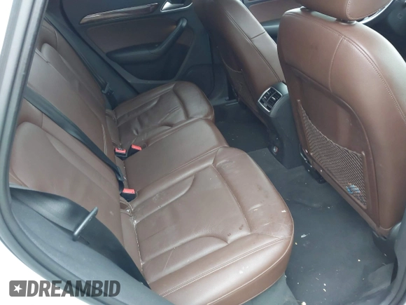 2017 Audi Q3 Premium with VIN WA1ECCFS5HR003565, listed as a IAAI auction lot 42140711 with 74,034 mi miles and . Bid and sale history available at DreamBid. Image 8.