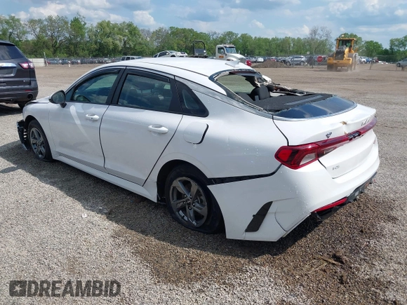 2023 Kia K5 LXS z VIN 5XXG14J25PG189448, wystawiony jako IAAI lot #42258739 z przebiegiem 29 188 mil mil oraz . Historia ofert i sprzedaży dostępna na DreamBid. Obrazek 3.