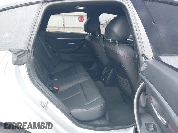 2018 BMW 4 Series 440i with VIN WBA4J5C57JBF07924, listed as a IAAI auction lot 41595682 with 75,121 mi miles and . Bid and sale history available at DreamBid. Image 8.