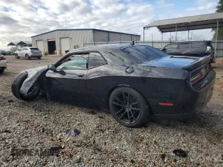 2017 Dodge Challenger SXT z VIN 2C3CDZAG3HH607149, wystawiony jako Copart lot #81941844 z przebiegiem 141 536 mil mil oraz Szkoda całkowita • Salvage title. Historia ofert i sprzedaży dostępna na DreamBid. Obrazek 2.