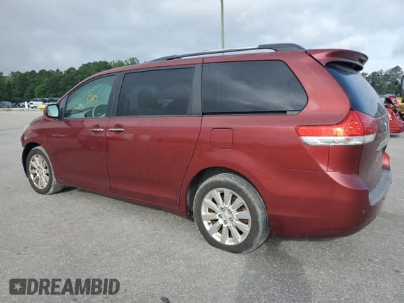 2011 Toyota Sienna XLE with VIN 5TDDK3DCXBS024257, listed as a Copart auction lot 60667145 with 283,609 mi miles and Salvage title. Bid and sale history available at DreamBid. Image 2.