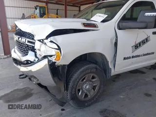 2023 Ram 2500 with VIN 3C7WR5AJ7PG567772, listed as a IAAI auction lot 42180314 with 48,197 mi miles and . Bid and sale history available at DreamBid. Image 18.