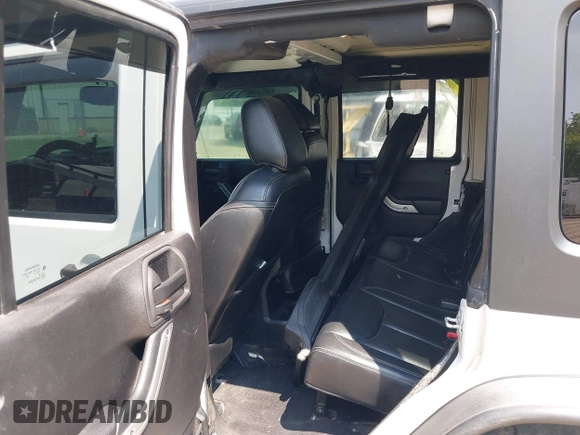 2015 Jeep Wrangler Unlimited Rubicon z VIN 1C4BJWFGXFL755810, wystawiony jako IAAI lot #42495531 z przebiegiem 109 668 mil mil oraz . Historia ofert i sprzedaży dostępna na DreamBid. Obrazek 8.