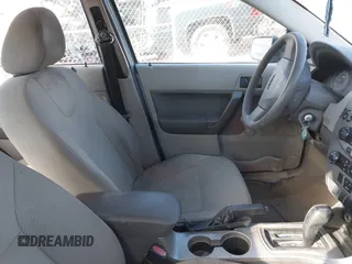 2008 Ford Focus S with VIN 1FAHP34NX8W223229, listed as a IAAI auction lot 38747770 with 232,432 mi miles. Bid and sale history available at carsss.com. Image 5.