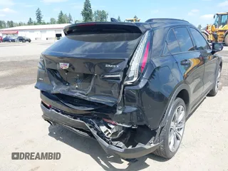 2019 Cadillac XT4 AWD Sport z VIN 1GYFZFR48KF119062, wystawiony jako IAAI lot #42449132 z przebiegiem 89 676 mil mil oraz . Historia ofert i sprzedaży dostępna na DreamBid. Obrazek 6.