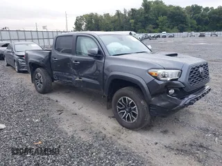 2021 Toyota Tacoma SR z VIN 3TMCZ5AN2MM377314, wystawiony jako IAAI lot #39776376 z przebiegiem 30 191 mil mil oraz . Historia ofert i sprzedaży dostępna na DreamBid. Obrazek 1.