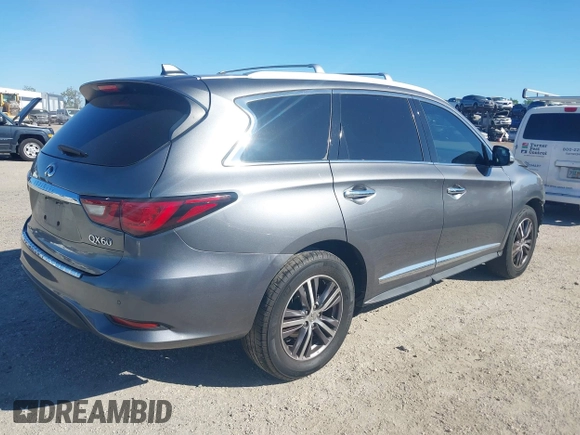2019 Infiniti QX60 Luxe with VIN 5N1DL0MN2KC560968, listed as a IAAI auction lot 42209216 with 83,679 mi miles and . Bid and sale history available at DreamBid. Image 4.