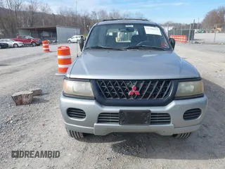 2000 Mitsubishi Montero Sport LS with VIN JA4LS31H9YP005577, listed as a IAAI auction lot 41590624 with 149,625 mi miles. Bid and sale history available at carsss.com. Image 12.