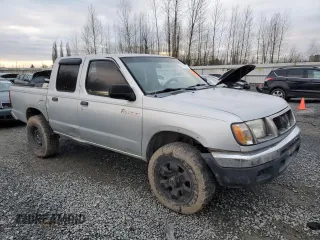 2000 Nissan Frontier XE z VIN 1N6ED27Y8YC368144, wystawiony jako Copart lot #87784565 z przebiegiem Nie podano mil oraz Czysty tytuł • Clean title. Historia ofert i sprzedaży dostępna na DreamBid. Obrazek 4.