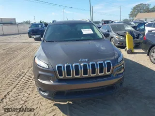 2014 Jeep Cherokee Latitude with VIN 1C4PJLCS4EW148960, listed as a IAAI auction lot 41111496 with 177,819 mi miles. Bid and sale history available at carsss.com. Image 12.