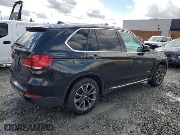 2014 BMW X5 sDrive35i with VIN 5UXKR2C50E0C01813, listed as a Copart auction lot 48896815 with 291,498 mi miles and Salvage Title. Bid and sale history available at carsss.com. Image 3.