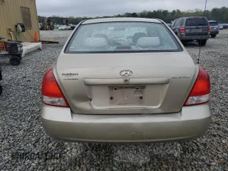 2003 Hyundai Elantra GLS z VIN KMHDN45D43U663926, wystawiony jako Copart lot #50036625 z przebiegiem 152 174 mil mil oraz Szkoda całkowita • Salvage title. Historia ofert i sprzedaży dostępna na DreamBid. Obrazek 6.