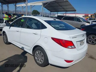 2017 Hyundai Accent SE with VIN KMHCT4AE0HU313703, listed as a IAAI auction lot 41839215 with 87,300 mi miles. Bid and sale history available at carsss.com. Image 3.