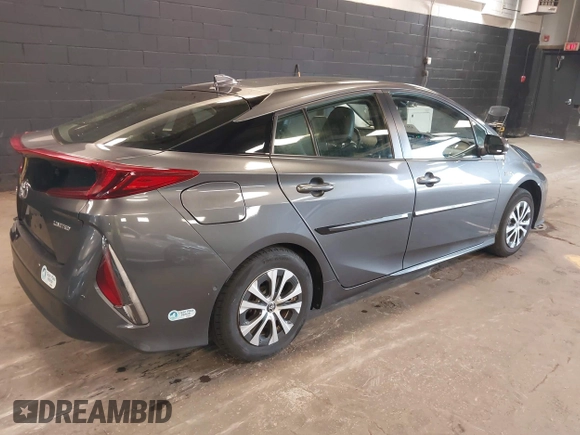 2021 Toyota Prius LE with VIN JTDKAMFP8M3175487, listed as a IAAI auction lot 42176936 with 78,153 mi miles and . Bid and sale history available at DreamBid. Image 4.