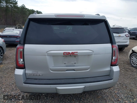 2015 GMC Yukon SLE with VIN 1GKS1AKC8FR201818, listed as a IAAI auction lot 41707754 with 193,100 mi miles. Bid and sale history available at carsss.com. Image 16.