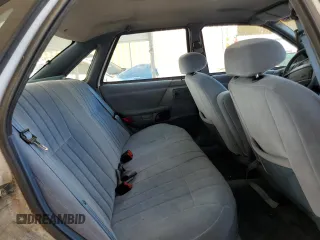 1992 Ford Taurus GL z VIN 1FALP52U5NA280821, wystawiony jako Copart lot #77457304 z przebiegiem 33 484 mil mil oraz Szkoda całkowita • Salvage title. Historia ofert i sprzedaży dostępna na DreamBid. Obrazek 10.