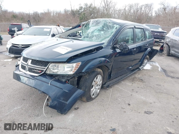 2013 Dodge Journey SE z VIN 3C4PDCAB7DT701180, wystawiony jako IAAI lot #41609700 z przebiegiem 118 207 mil mil oraz . Historia ofert i sprzedaży dostępna na DreamBid. Obrazek 2.