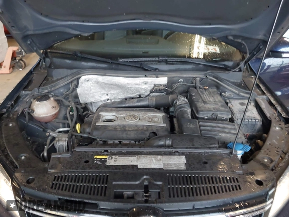 2016 Volkswagen Tiguan S with VIN WVGBV7AXXGW565289, listed as a IAAI auction lot 42113317 with 83,537 mi miles and . Bid and sale history available at DreamBid. Image 10.
