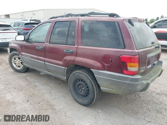 2003 Jeep Grand Cherokee Laredo with VIN 1J4GX48S83C576892, listed as a IAAI auction lot 42082865 with 212,157 mi miles. Bid and sale history available at carsss.com. Image 3.