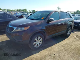 2013 Kia Sorento LX with VIN 5XYKT3A17DG375103, listed as a IAAI auction lot 42327291 with 228,761 mi miles and . Bid and sale history available at DreamBid. Image 2.