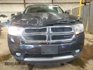 2013 Dodge Durango Crew with VIN 1C4RDJDG2DC663518, listed as a Copart auction lot 62736515 with 226,720 mi miles and Salvage title. Bid and sale history available at DreamBid. Image 5.