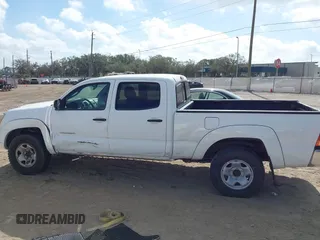 2005 Toyota Tacoma PreRunner with VIN 3TMKU72N65M001821, listed as a IAAI auction lot 41579911 with 301,297 mi miles. Bid and sale history available at carsss.com. Image 13.