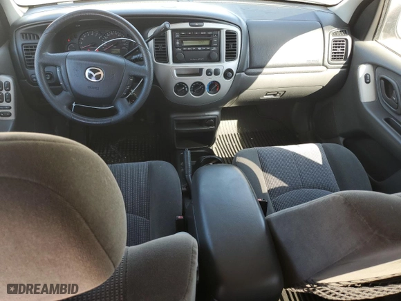 2003 Mazda Tribute LX with VIN 4F2YZ04123KM23151, listed as a Copart auction lot 74117164 with 112,790 mi miles and Salvage Title. Bid and sale history available at carsss.com. Image 8.