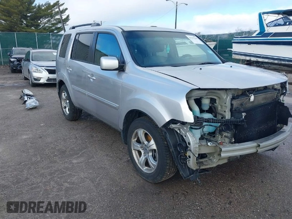 2013 Honda Pilot EX-L with VIN 5FNYF3H76DB013332, listed as a IAAI auction lot 41193240 with 121,308 mi miles and . Bid and sale history available at DreamBid. Image 1.