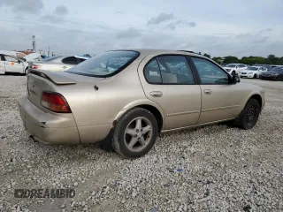 1997 Nissan Maxima GXE с VIN JN1CA21D2VM528522, выставлен на аукционе Copart как лот 73315194 с пробегом 206 683 миль миль и Списание • Salvage title. История ставок и продаж доступна на DreamBid. Изображение 3.