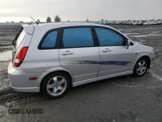 2004 Suzuki Aerio SX z VIN JS2RC61HX45253671, wystawiony jako Copart lot #85587754 z przebiegiem 171 436 mil mil oraz Szkoda całkowita • Salvage title. Historia ofert i sprzedaży dostępna na DreamBid. Obrazek 3.