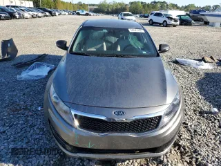 2012 Kia Optima LX z VIN 5XXGM4A7XCG077323, wystawiony jako Copart lot #50527465 z przebiegiem 194 243 mil mil oraz Szkoda całkowita • Salvage title. Historia ofert i sprzedaży dostępna na DreamBid. Obrazek 5.