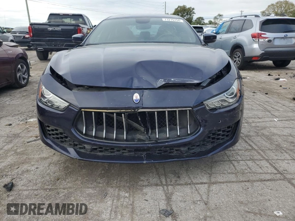 2018 Maserati Ghibli z VIN ZAM57XSA5J1287424, wystawiony jako Copart lot #71215154 z przebiegiem 20 029 mil mil oraz Szkoda całkowita • Salvage title. Historia ofert i sprzedaży dostępna na DreamBid. Obrazek 5.