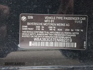 2014 BMW 3 Series 328i xDrive with VIN WBA3B3G57ENR82319, listed as a IAAI auction lot 41655950 with 130,926 mi miles. Bid and sale history available at carsss.com. Image 9.
