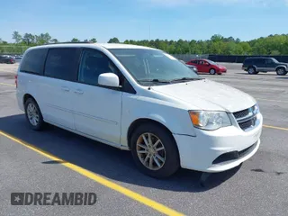 2016 Dodge Grand Caravan SXT with VIN 2C4RDGCG5GR396147, listed as a IAAI auction lot 42047166 with 166,785 mi miles. Bid and sale history available at carsss.com. Image 1.