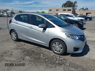 2015 Honda Fit LX z VIN 3HGGK5H51FM750102, wystawiony jako IAAI lot #42278830 z przebiegiem 121 855 mil mil oraz . Historia ofert i sprzedaży dostępna na DreamBid. Obrazek 1.