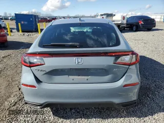 2023 Honda Civic Sport with VIN 19XFL2H88PE000014, listed as a Copart auction lot 43042575 with 28,836 mi miles and Salvage Title. Bid and sale history available at DreamBid. Image 6.