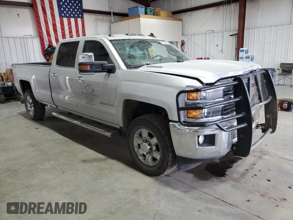 2015 Chevrolet Silverado 3500HD LTZ with VIN 1GC4K0E85FF618155, listed as a Copart auction lot 70803034 with 188,428 mi miles and Salvage Title. Bid and sale history available at carsss.com. Image 4.