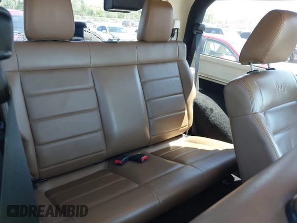 2011 Jeep Wrangler Sahara with VIN 1J4AA5D13BL562732, listed as a IAAI auction lot 41838520 with 148,359 mi miles and . Bid and sale history available at DreamBid. Image 8.