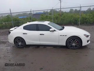 2018 Maserati Ghibli S Q4 z VIN ZAM57YTA5J1268683, wystawiony jako IAAI lot #42359671 z przebiegiem 54 981 mil mil oraz . Historia ofert i sprzedaży dostępna na DreamBid. Obrazek 13.
