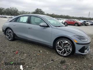2023 Hyundai IONIQ 6 SEL with VIN KMHM34AA6PA032250, listed as a Copart auction lot 85628954 with 13,699 mi miles and Salvage Title. Bid and sale history available at carsss.com. Image 4.