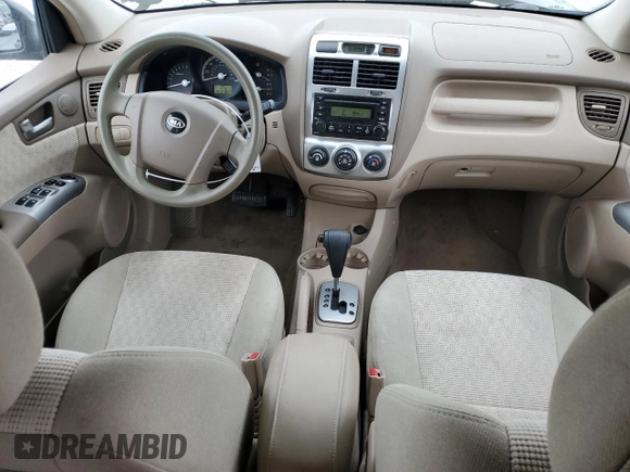 2005 Kia Sportage LX with VIN KNDJF723657074234, listed as a Copart auction lot 86792794 with 97,548 mi miles and Salvage Title. Bid and sale history available at carsss.com. Image 8.