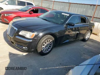 2014 Chrysler 300 with VIN 2C3CCAAG4EH184730, listed as a Copart auction lot 54198745 with 174,924 mi miles and Salvage title. Bid and sale history available at DreamBid. Image 1.