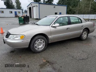 2002 Lincoln Continental with VIN 1LNHM97V22Y693053, listed as a Copart auction lot 85540044 with 179,465 mi miles and Salvage Title. Bid and sale history available at carsss.com. Image 1.