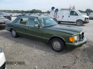 1990 Mercedes-Benz 560 z VIN WDBCA39E4LA548591, wystawiony jako Copart lot #70799134 z przebiegiem 146 323 mil mil oraz Szkoda całkowita • Salvage title. Historia ofert i sprzedaży dostępna na DreamBid. Obrazek 4.