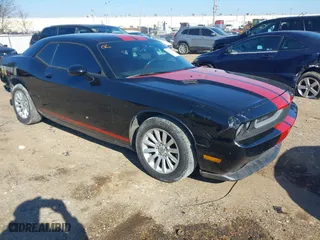 2013 Dodge Challenger SXT with VIN 2C3CDYAG5DH631358, listed as a IAAI auction lot 41307511 with 145,683 mi miles. Bid and sale history available at carsss.com. Image 1.