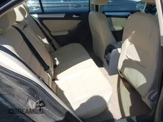 2012 Volkswagen Jetta TDI w/Premium & Nav z VIN 3VWLL7AJ7CM400382, wystawiony jako IAAI lot #42274839 z przebiegiem 150 205 mil mil oraz . Historia ofert i sprzedaży dostępna na DreamBid. Obrazek 8.
