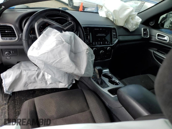 2022 Jeep Grand Cherokee Laredo E with VIN 1C4RJFAG0NC124987, listed as a Copart auction lot 46229435 with 43,786 mi miles and Salvage title. Bid and sale history available at DreamBid. Image 8.