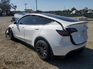 2024 Tesla Model Y Performance with VIN 7SAYGDEF4RF064210, listed as a Copart auction lot 52498805 with 14,318 mi miles and Non Repairable. Bid and sale history available at DreamBid. Image 2.